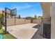 Backyard basketball court features a concrete slab, storage, and tall brick perimeter at 4402 E Barwick Dr, Cave Creek, AZ 85331