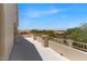 Open-air balcony showcases beautiful neighborhood and desert landscaping views at 4402 E Barwick Dr, Cave Creek, AZ 85331