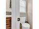 A bathroom with a toilet and window at 4402 E Barwick Dr, Cave Creek, AZ 85331