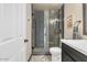 Modern bathroom featuring a glass shower, mosaic tile floors, and a sleek vanity at 4402 E Barwick Dr, Cave Creek, AZ 85331