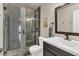 Remodeled bathroom featuring a glass shower, updated vanity, and modern fixtures at 4402 E Barwick Dr, Cave Creek, AZ 85331