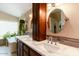 Bright bathroom features double sinks with granite countertops and a separate soaking tub at 4402 E Barwick Dr, Cave Creek, AZ 85331