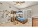 Bedroom featuring a bunk bed with a built-in ladder and adjacent display shelves at 4402 E Barwick Dr, Cave Creek, AZ 85331