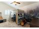 Vaulted bedroom with bed loft and a mural of a forest at 4402 E Barwick Dr, Cave Creek, AZ 85331