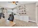 This bedroom has built-in cabinets with a desk, as well as window shutters at 4402 E Barwick Dr, Cave Creek, AZ 85331
