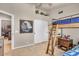 Bedroom featuring a bunk bed with a built-in ladder, and decor above the closet at 4402 E Barwick Dr, Cave Creek, AZ 85331