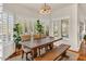 Dining room with a view to the outdoors through plantation shutters; dark wood floors at 4402 E Barwick Dr, Cave Creek, AZ 85331
