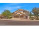 Sprawling two-story house featuring a three-car garage and mature trees in a desirable neighborhood at 4402 E Barwick Dr, Cave Creek, AZ 85331