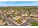 Stunning aerial view of home featuring a refreshing pool and beautiful desert landscaping in a gated community at 4402 E Barwick Dr, Cave Creek, AZ 85331