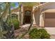 Charming single-Gathering home with desert landscaping and a quaint front entrance at 4402 E Barwick Dr, Cave Creek, AZ 85331