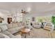 Spacious living room with seating, ceiling fan and windows that bring the outdoor in at 4402 E Barwick Dr, Cave Creek, AZ 85331