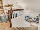View from the second story overlooking the living room with neutral furniture and decor at 4402 E Barwick Dr, Cave Creek, AZ 85331