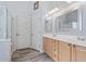 Bathroom featuring double sinks and a walk-in shower at 4667 E County Down Dr, Chandler, AZ 85249
