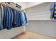 Walk-in closet with shelving and hanging space for organized storage solutions at 4667 E County Down Dr, Chandler, AZ 85249