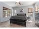 Bright main bedroom features large windows, neutral walls, and tile flooring for comfortable living at 4667 E County Down Dr, Chandler, AZ 85249