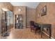 Inviting office space with decorative walls and an area for both work and reading at 4667 E County Down Dr, Chandler, AZ 85249