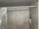 Tiled shower equipped with a shower niche for toiletries at 5110 N 42Nd Dr, Phoenix, AZ 85019