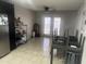 Living room with table and a view of an outdoor patio at 5110 N 42Nd Dr, Phoenix, AZ 85019