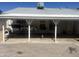 Backyard covered patio with cooking area and brick flooring provides a relaxing and functional space at 5110 N 42Nd Dr, Phoenix, AZ 85019