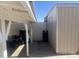 Covered storage area with a shed and tires for storage, offering practical space at 5110 N 42Nd Dr, Phoenix, AZ 85019