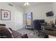 Cozy bedroom with a vaulted ceiling, ceiling fan, and natural light at 5211 W Wikieup Ln, Glendale, AZ 85308