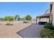 Spacious backyard featuring a seating area under a gazebo, a swing set, and manicured landscaping at 5724 N 108Th Ave, Phoenix, AZ 85037