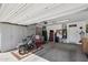 Spacious garage featuring ample storage cabinets and space for tools, bikes, and projects at 5724 N 108Th Ave, Phoenix, AZ 85037