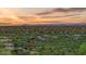 Expansive aerial view showcasing the property's lush surroundings and neighborhood at 6432 E El Sendero Rd, Carefree, AZ 85377