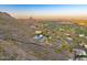 Desert home with a pool and mountain view, surrounded by native vegetation at 6432 E El Sendero Rd, Carefree, AZ 85377