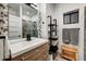 Bathroom features modern vanity, decorative mirror, and glass-enclosed shower at 6432 E El Sendero Rd, Carefree, AZ 85377