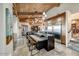 Spacious kitchen featuring wood-beamed ceilings, sleek stainless steel appliances, and modern design elements at 6432 E El Sendero Rd, Carefree, AZ 85377