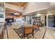 Open living area with beamed ceilings, an elegant rug and a sophisticated lighting fixture at 6432 E El Sendero Rd, Carefree, AZ 85377