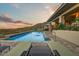 Stunning pool with a stone patio and desert landscape, perfect for relaxation and enjoying Arizona sunsets at 6432 E El Sendero Rd, Carefree, AZ 85377