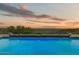 Stunning pool featuring an infinity edge with desert and mountain views at 6432 E El Sendero Rd, Carefree, AZ 85377