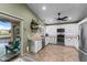 Bright kitchen with stainless steel appliances and backyard access at 6907 W Monona Dr, Glendale, AZ 85308