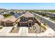Inviting two-story home with a stone-accented entry, attached two-car garage, and desert landscaping at 7123 W Andrea Dr, Peoria, AZ 85383