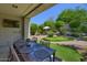 Backyard haven with putting green and outdoor dining at 7128 E Bramble Berry Ln, Scottsdale, AZ 85266