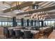 Upscale bar area featuring marble countertops, modern lighting, and comfortable seating at 7128 E Bramble Berry Ln, Scottsdale, AZ 85266