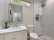Clean, bright bathroom with a shower and marble sink at 7128 E Bramble Berry Ln, Scottsdale, AZ 85266