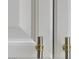 Close-up of white kitchen cabinets with stylish pulls at 7128 E Bramble Berry Ln, Scottsdale, AZ 85266