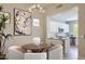 An eat-in dining nook next to the kitchen features lots of light and modern decor at 7128 E Bramble Berry Ln, Scottsdale, AZ 85266