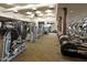 Well-equipped fitness center with various machines and ample space for workouts at 7128 E Bramble Berry Ln, Scottsdale, AZ 85266