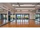 Bright gym with mirrored walls and scenic views at 7128 E Bramble Berry Ln, Scottsdale, AZ 85266