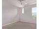 Bright bedroom with two windows, ceiling fan, neutral paint and soft carpet at 7492 E Via De Luna Dr, Scottsdale, AZ 85255