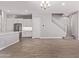 Bright open floorplan with neutral walls, tile floors, and stairs to the second level at 7492 E Via De Luna Dr, Scottsdale, AZ 85255
