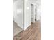 Bedroom featuring a closet area with an open door and built-in shelving at 7730 W Mulberry Dr, Phoenix, AZ 85033