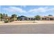 Charming single-story home featuring a cozy front yard and a classic suburban street view at 7730 W Mulberry Dr, Phoenix, AZ 85033