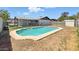 Inviting backyard pool is surrounded by a concrete trim and awaits summer fun at 7730 W Mulberry Dr, Phoenix, AZ 85033