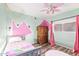 Adorable room featuring colorful walls, wooden furniture, and a hardwood floor at 8132 E Onza Ave, Mesa, AZ 85212