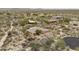 Birds eye view of a large lot with desert landscaping and an attractive home in a housing community at 8698 E Preserve Way, Scottsdale, AZ 85266